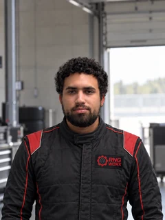 Raul Santana Rios in a black and red RNG WORX racing suit